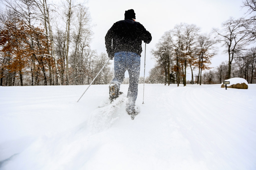 man cross country skiing