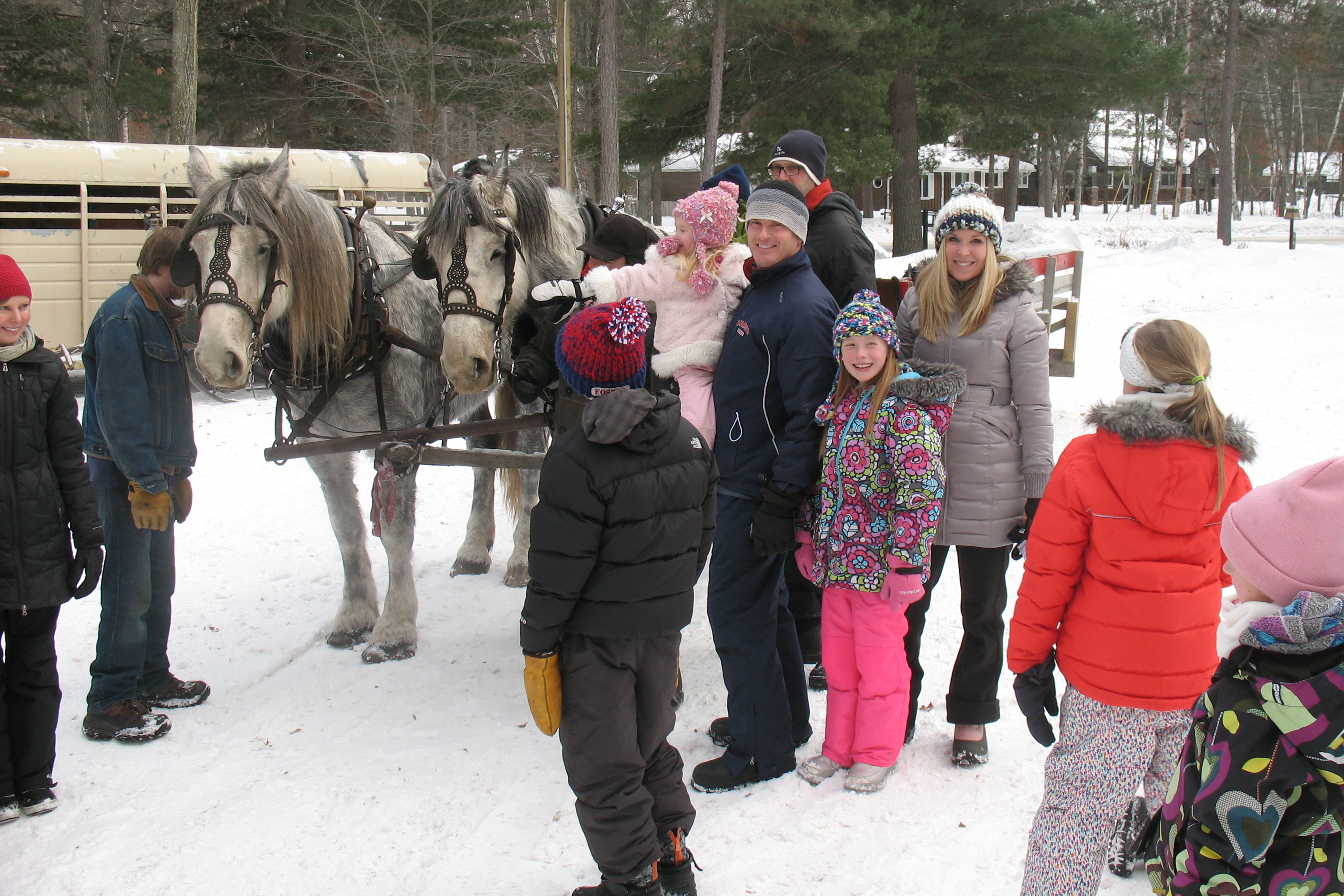 Winter Weekend families waiting for sleigh ride