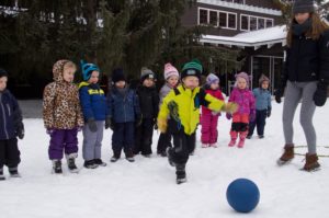 kids playng outside at Winter Weekend
